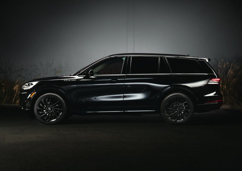 A 2024 Lincoln Aviator® SUV is shown in the Infinite Black exterior color | Jenkins & Wynne Lincoln in Clarksville TN