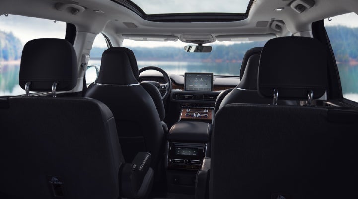 The interior of a 2024 Lincoln Aviator® SUV from behind the second row | Jenkins & Wynne Lincoln in Clarksville TN
