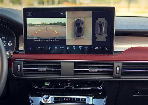 The driver of a 2024 Lincoln Corsair® SUV is shown selecting the drive mode. | Jenkins & Wynne Lincoln in Clarksville TN
