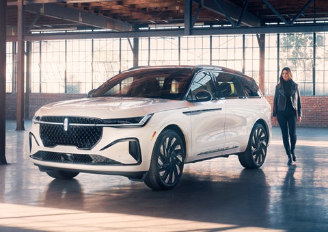 A person approaches a 2024 Lincoln Nautilus® SUV. | Jenkins & Wynne Lincoln in Clarksville TN