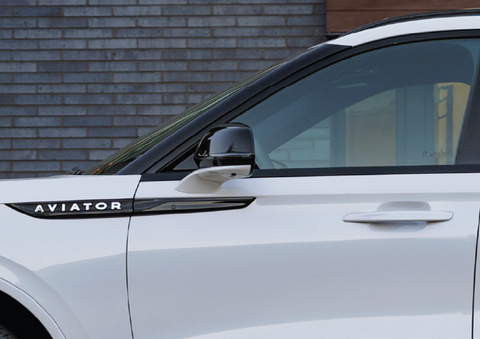 The driver’s door of a white 2025 Lincoln Aviator® SUV is showcased. | Jenkins & Wynne Lincoln in Clarksville TN