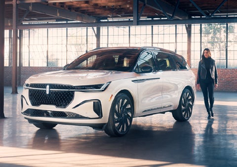 A person approaches a 2025 Lincoln Nautilus® SUV. | Jenkins & Wynne Lincoln in Clarksville TN