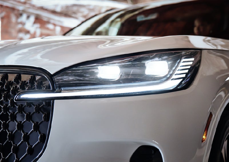 A close-up of a headlamp on the 2026 Lincoln Aviator® SUV is shown. | Jenkins & Wynne Lincoln in Clarksville TN